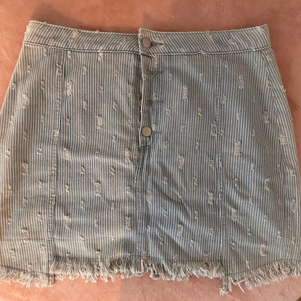 Blue denim skirt with small white stripes